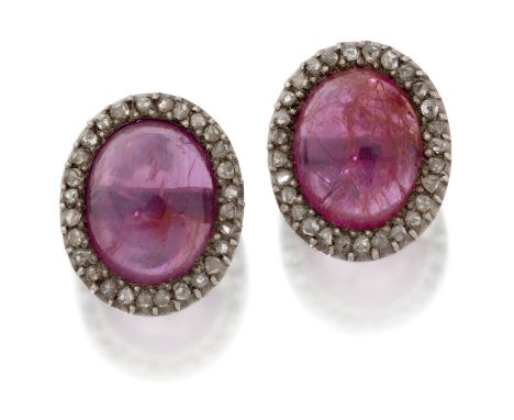 A pair of cabochon ruby and diamond earrings, the oval cabochon rubies, with an estimated total carat weight of approximately