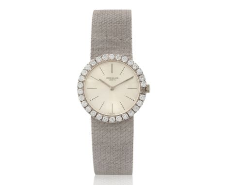 Patek Philippe. A lady's white gold and diamond set bracelet watchRef:  3345, Case Number 2685214, Movement number 1167845, C