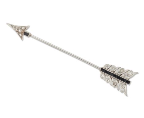 An Art Deco diamond and onyx set arrow pin or jabot, with rose-cut diamonds and baguette cut onyx millegrain set to the arrow
