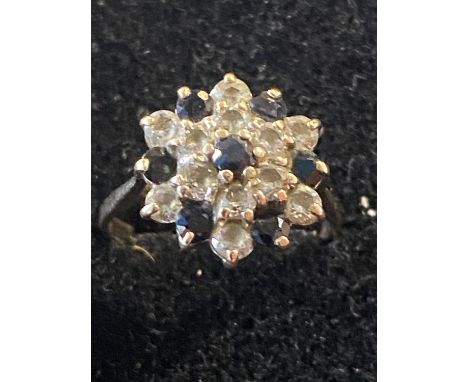 A 9ct gold sapphire and white stone cluster ring size J gross weight 2.30g 