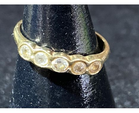 A 9ct gold and five white stone ring. 1.65 grams 