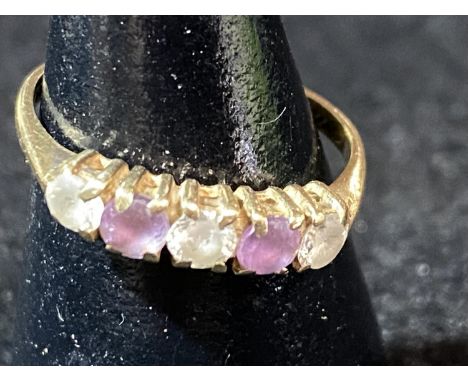 A 9ct gold and coloured stone ring. 1.61 grams 