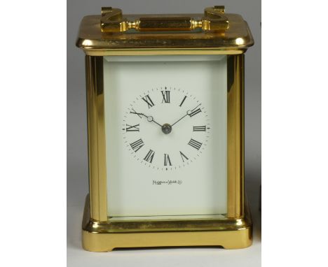 A brass carriage clock, the white enamel dial signed Mappin and Webb Ltd, Roman numerals, the 11 jewel movement signed Made i