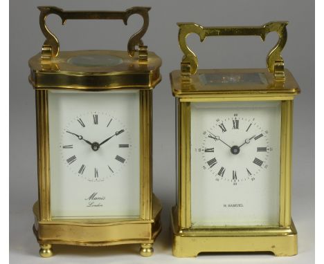 A brass ogee carriage clock, the enamel dial signed Manis, London, the movement signed Fema, London, 11 jewels and Made in En