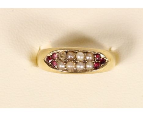 A Victorian 15ct gold ruby and half pearl ring, Birmingham 1895, one setting vacent, ) 1/2, 2.8gm.