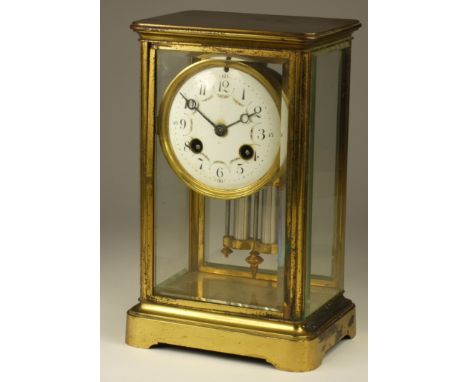 A French four glass brass mantle clock, the white enamel dial with Arabic numerals, the movement signed Hy. Marc, Paris, numb