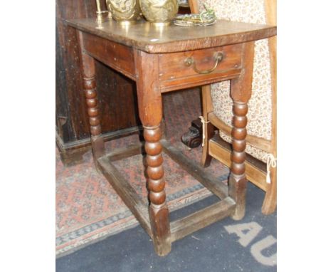 18th c. oak side table with drawer to side above bobbin-turned legs with stretchers