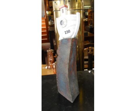 Studio Pottery - Rob Whelpton (b.1952) “Boat on a Rock” sculpture of a glazed stylised boat resting atop an oxidised tall roc