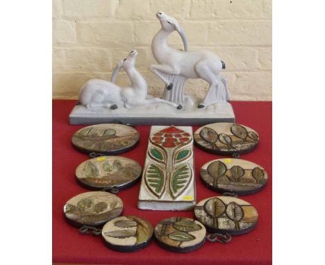 Soholm Denmark rectangular plaque, two West German circular hanging plaque sets and a French Art Deco style model group Condi