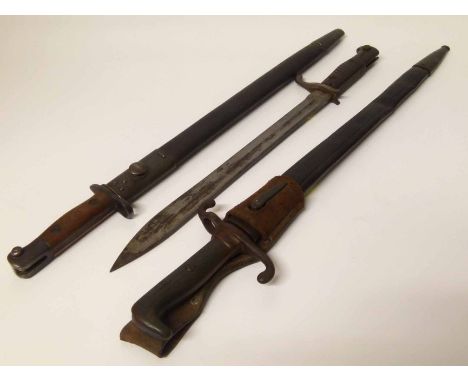 1907 Wilkinson S.M.L.E. bayonet, late 19th century Mauser bayonet and a WW1 Mauser bayonet Condition report: see terms and co