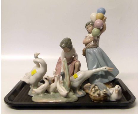 Five Lladro figures and two Nao figures. Condition report: see terms and conditions