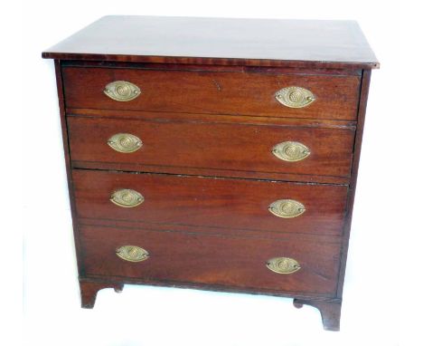 Mid 19th century mahogany commode chest.  Rectangular top with black stringing hinged to reveal pottery chamber pot, front wi