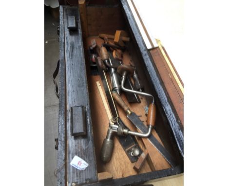 A WOODEN TOOL CHEST AND TOOLS