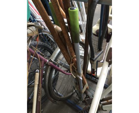 A BUNDLE OF GARDEN TOOLS