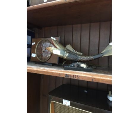 A MANTLE CLOCK AND A FISH LAMP