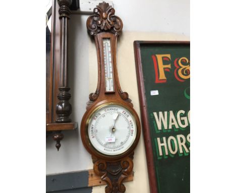 CARVED OAK ANEROID BAROMETER. L90CM