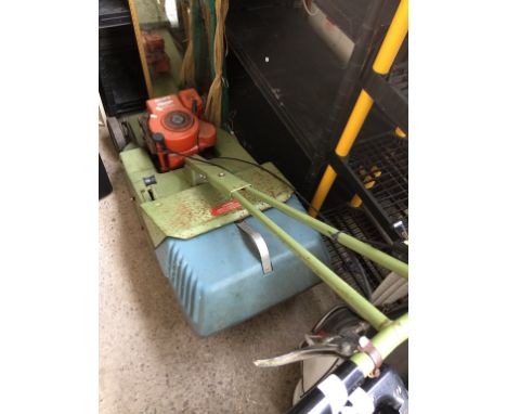 A HAYTER 3.5 HP BRIGGS AND STRATTON ENGINE PETROL LAWN MOWER