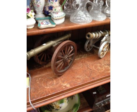 TWO CAST OR WOOD MODEL CANNONS