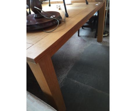 A MODERN LIGHT OAK TABLE