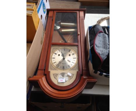 AN ACCTIM WALL CLOCK T3
