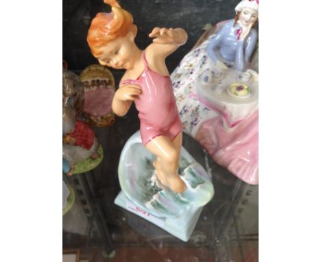 A ROYAL WORCESTER FIGURE JULY 3440 BY DOUGHTY C
