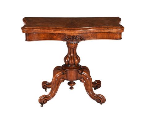 
	
		A Victorian walnut foldover card table, 91cm wide, 74cm high, 43cm deep
		
		Condition Report: 
		Rebaized. faded exposi