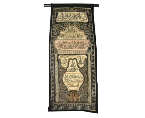 
	
		An Ottoman silk and metal thread embroidered silk curtain, probably Egypt, the text on this piece, which is possibly a s