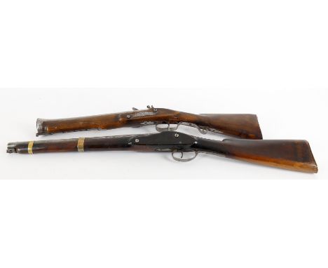 
	
		Militaria- an Indian made flintlock blunderbuss, 20th century, metalwork stamped H.A.L , crowned V, 69cm long; and an In