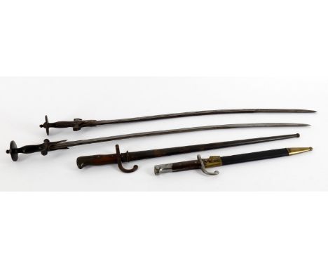 
	
		Militaria- two late 19th century Continental bayonets, the first W K &amp; Cie Solingen, M9770, brass mounted leather sc