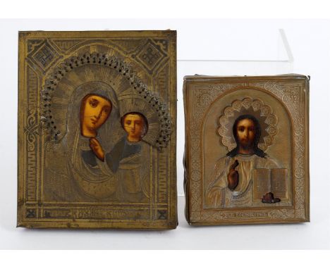 
	
		Two late 19th Russian Icons including a  small brass mounted Kazam Mother of God icon, 18 by 14.5cms; and a small brass 