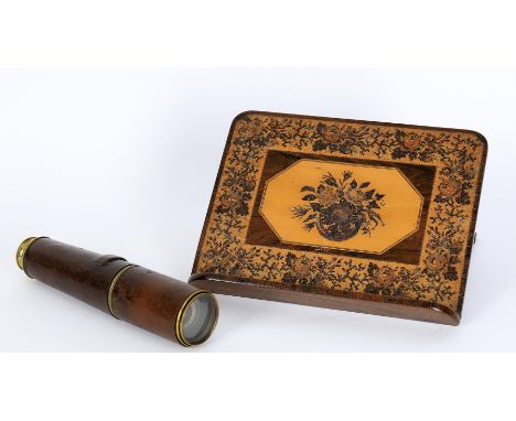 
	
		A late Victorian rosewood and Tunbridge ware book stand, 32cm wide, 24cm high; and a World War I leather and brass milit