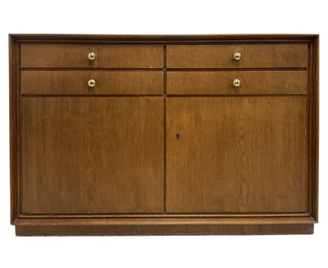 Oak sideboard, the rectangular top over four short drawers and two cupboard doors, opening to reveal one fixed shelfDimension