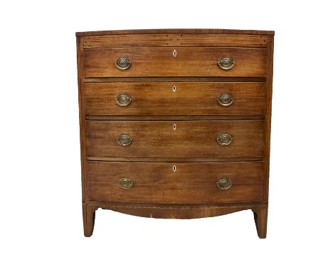 Early 19th century mahogany bow front chest inlaid with ebonised stringing, fitted with four drawers with ivory and bone escu