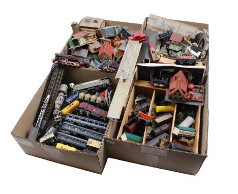 4 boxes including locomotives, wagons including Fleischmann, Liliput, Hornby, Lima etc, train tracks, plastic houses etc.