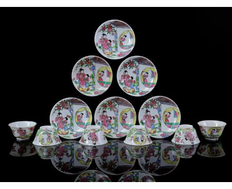 6 porcelain Famille Rose cups and saucers with decoration of people at home, Japan 19th/20th century