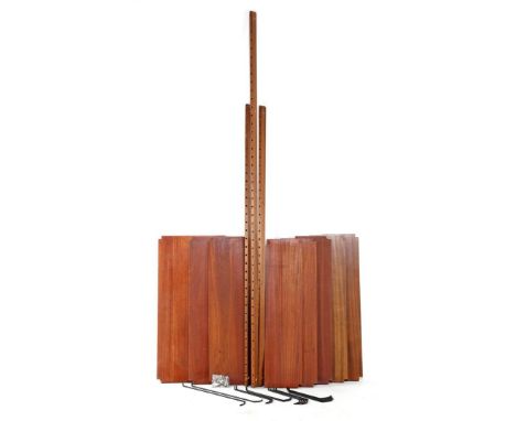 Poul Cadovius (1911-2011)Modular teak veneer wall unit consisting of 3 wall slats, 202 and 154 cm high, 8 shelves 80 cm and 1