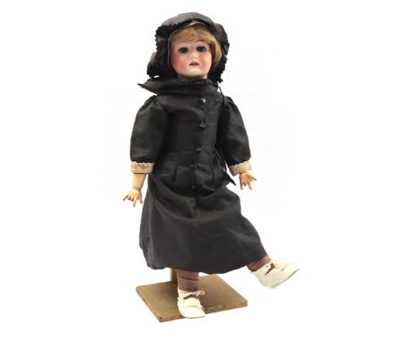 Doll with porcelain head and sleep eyes, marked Heubach 250.4 Köppelsdorf Germany, with composite body, movable arms and legs