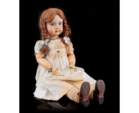 Doll with porcelain head, marked Fabrication Francaise Limoges France J.B. 14, with composite body, movable arms and legs, ea