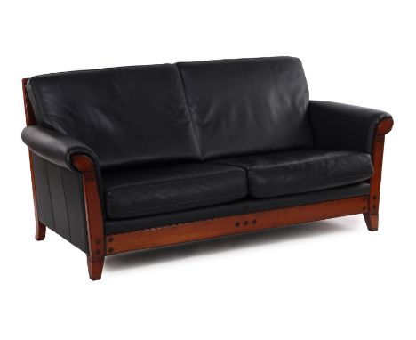 2-seater sofa with black leather cushions and walnut frame in Schuitema style, 186 cm wide