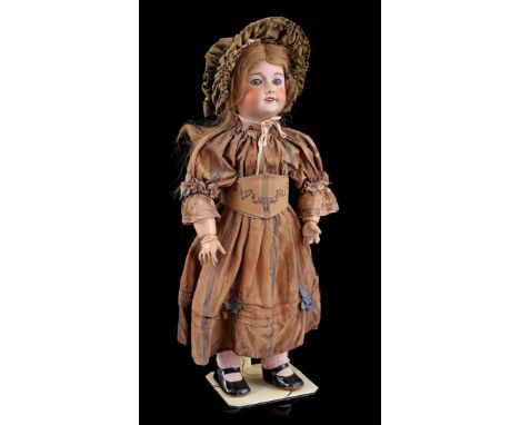 Doll with porcelain head and sleep eyes, marked Unis France 71/ 149/ 301, with composite body, movable arms and legs, early 2