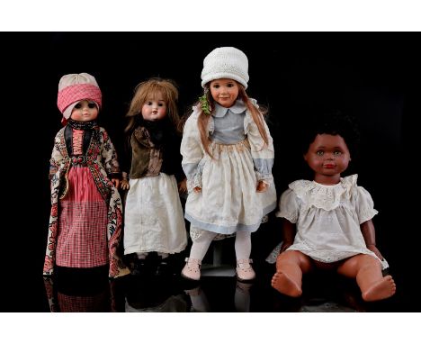 4 different dolls including 19th century with porcelain head, marked LC, largest doll is 68 cm long