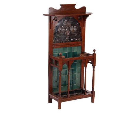 Mahogany with oak umbrella stand with copper decorative plate with embossed floral decoration, earthenware green glazed tile 