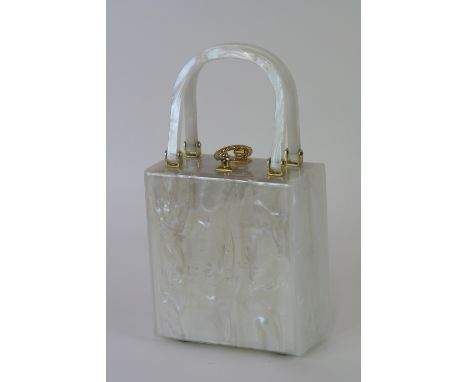 A vintage Lucite mother of pearl effect handbag