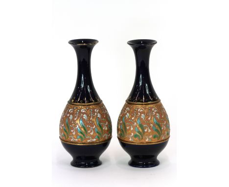 A pair of Royal Doulton, Slater patent vases, decorated with band of enamel floral decoration on deep blue ground, 25.5cm 