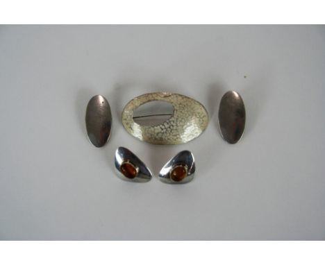 A pair of Danish Sterling Silver ear-rings, by Niels; a pair of silver and amber ear-rings marked Ecurdor 925; and a silver a