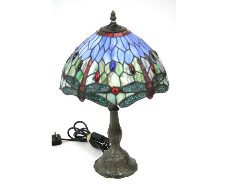 A Tiffany style table lamp, the shade decorated with dragon fly's, 51cm 