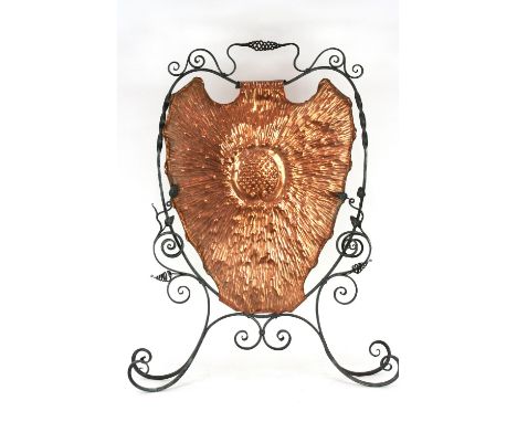 An Arts & Crafts copper and wrought iron firescreen, 80cm high in extremes 