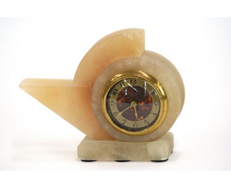 An Art Deco alabaster mantel clock, of shaped form, 12.5cm high