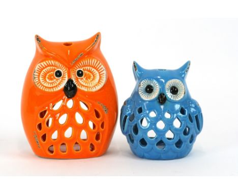 Four tea light holders, in the form of owls, 19cm; and two smaller examples, 14.5cm