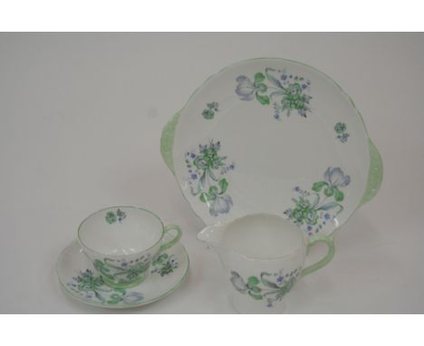 A collection of Shelley floral decorated teaware, comprising serving plate, 6 cups, 6 saucers, 6 side plates, cream jug and s